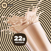 Shake de BOLD Whey sabor Milkshake de Baunilha com efeito de splash sobre fundo listrado bege